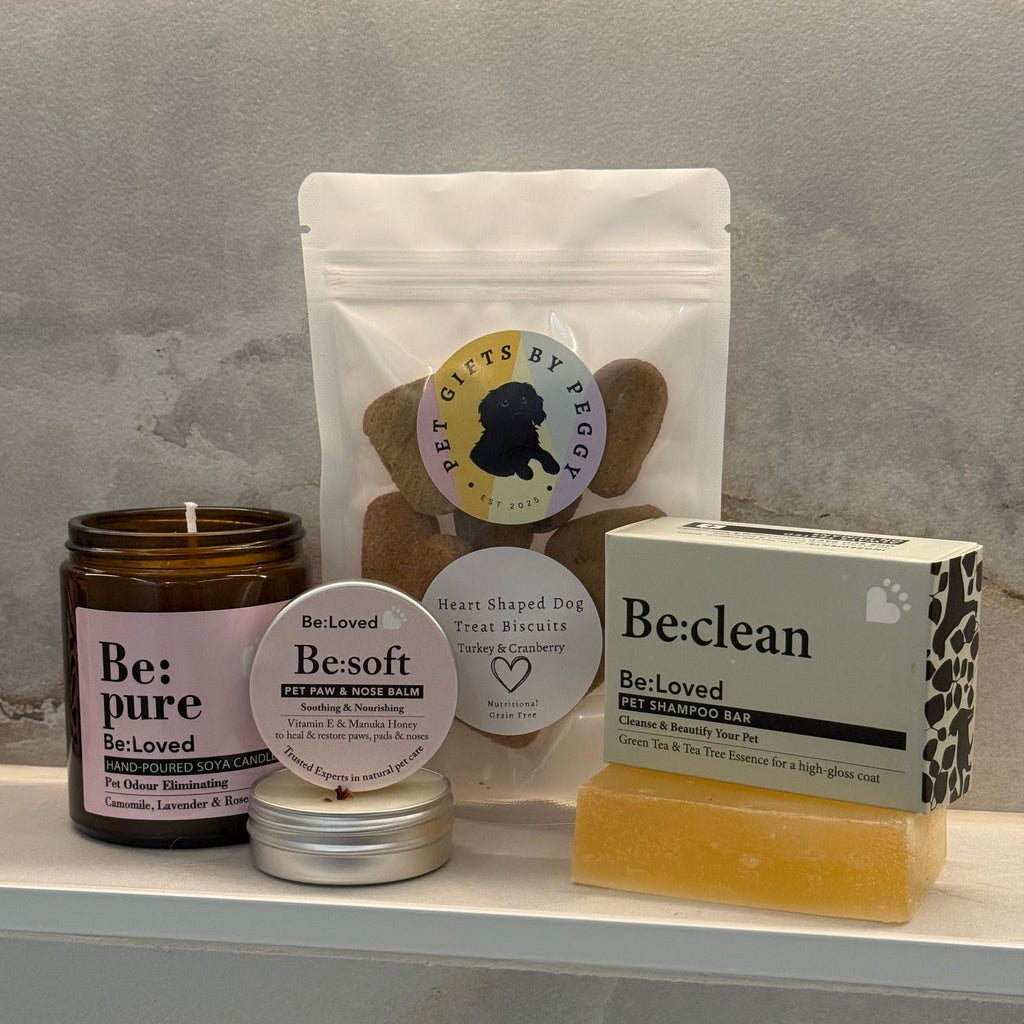 Dog treats, candle, balm and dog shampoo bar in a bathroom