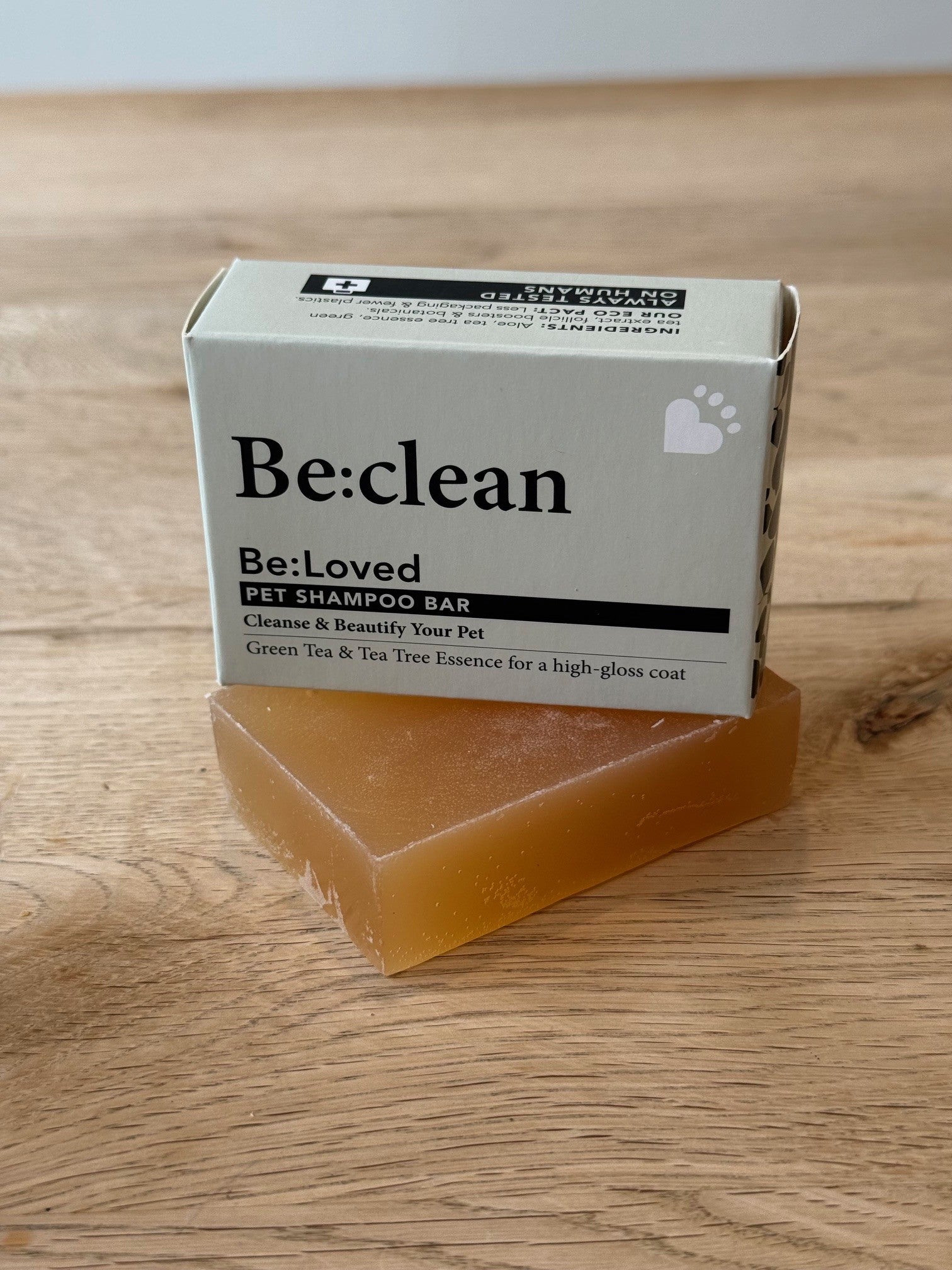 Be:clean pet shampoo bar on a wooden surface
